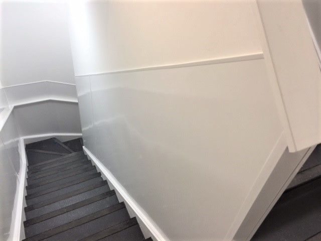 Staiurcase cladded with white PVC hygienic wall lining