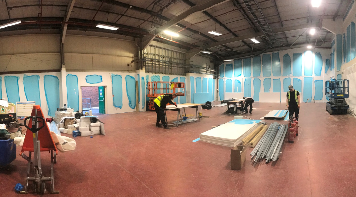 The Hygienik team during the installation of PVC wall cladding