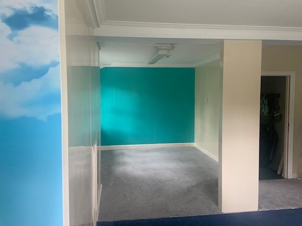 Ivory and turquoise PVC wall cladding